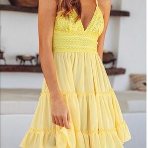 Yellow lace dress with back tie.